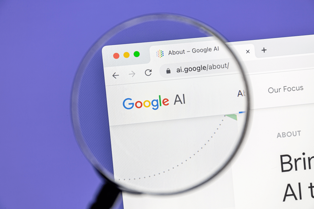 Página de Google AI con enfoque en inteligencia artificial, vista a través de una lupa.