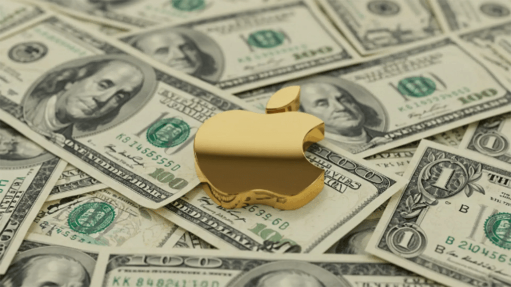 Logo de Apple en color dorado sobre un fondo de billetes de 100 dólares.